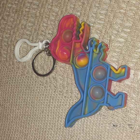 POPPERS TYRANNOSAURUS REX KEYCHAIN CHARM NRMINT CONDITION - Picture 3 of 3